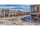Bustling street view captures a retail center, filled with a variety of shops, businesses and pedestrians crossing the street at 20 Screven Ne St, Atlanta, GA 30307