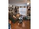 A cozy living room features a comfortable sofa and unique decorative art at 315 Saratoga Pl, Riverdale, GA 30296