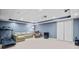 Spacious basement featuring plush carpeting, neutral walls, and a comfortable seating area with a projector setup at 1421 Briarcliff Dr, Woodstock, GA 30189