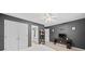 Bedroom featuring neutral carpet, overhead lighting, and gray walls at 1421 Briarcliff Dr, Woodstock, GA 30189