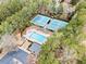 Aerial view of the community pool, tennis courts, and playground at 1421 Briarcliff Dr, Woodstock, GA 30189