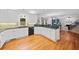Lovely kitchen with hardwood floors, sleek appliances, and plenty of counter space for cooking at 1421 Briarcliff Dr, Woodstock, GA 30189