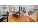 Inviting living room with natural light, neutral paint, and adjacent to the breakfast nook and kitchen at 1421 Briarcliff Dr, Woodstock, GA 30189