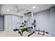 Basement workout room featuring carpeted floors, neutral paint, and weightlifting equipment at 1421 Briarcliff Dr, Woodstock, GA 30189