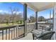 Enjoy the outdoors on the front porch overlooking the street with seating for relaxing and entertaining at 1450 Donald Lee Hollowell Nw Pkwy, Atlanta, GA 30318