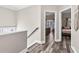 Hallway leading to bedrooms with hardwood floors and neutral paint at 1450 Donald Lee Hollowell Nw Pkwy, Atlanta, GA 30318