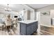 Open concept kitchen with a large island, stainless steel appliances, and hardwood floors at 1450 Donald Lee Hollowell Nw Pkwy, Atlanta, GA 30318