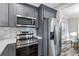 Efficient kitchen layout with stainless steel appliances, perfect for cooking and entertaining at 1450 Donald Lee Hollowell Nw Pkwy, Atlanta, GA 30318