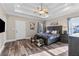 A spacious main bedroom suite boasts trey ceilings, hardwood floors, and abundant natural light at 1450 Donald Lee Hollowell Nw Pkwy, Atlanta, GA 30318