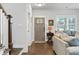 Inviting living room with hardwood floors, comfortable seating, and lots of natural light at 200 Oakside Way, Lawrenceville, GA 30046