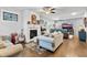 Bright living room featuring a fireplace, hardwood floors, and stylish furnishings for relaxation at 200 Oakside Way, Lawrenceville, GA 30046