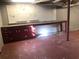 Basement workspace with cabinets and a workbench at 2076 Dobbins Nw Dr, Kennesaw, GA 30144