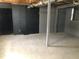 Unfinished basement with exposed ductwork and painted walls at 2076 Dobbins Nw Dr, Kennesaw, GA 30144