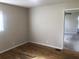 Bedroom showcasing hardwood flooring and natural light at 2076 Dobbins Nw Dr, Kennesaw, GA 30144