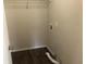 Walk-in closet with built-in shelving and visible connections at 2076 Dobbins Nw Dr, Kennesaw, GA 30144