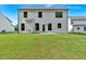 A large, grassy backyard view of the exterior of a two-story home at 380 Waterbluff Dr, Mableton, GA 30126