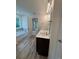 Well-lit bathroom with double vanity, soaking tub and walk-in shower at 380 Waterbluff Dr, Mableton, GA 30126