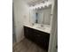Double sink bathroom vanity with modern mirrors and lighting at 380 Waterbluff Dr, Mableton, GA 30126