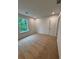 Cozy bedroom featuring carpet flooring and natural light from the window at 380 Waterbluff Dr, Mableton, GA 30126