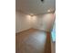 The bedroom features neutral carpet flooring, white walls, and double-door closet at 380 Waterbluff Dr, Mableton, GA 30126