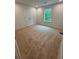 A view of the bedroom featuring carpet floors and window with natural light at 380 Waterbluff Dr, Mableton, GA 30126