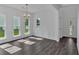 Elegant dining area featuring hardwood floors, natural light, and classic trim at 380 Waterbluff Dr, Mableton, GA 30126