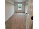 Spacious walk-in closet with window and wire shelving at 380 Waterbluff Dr, Mableton, GA 30126
