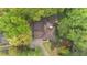 Aerial view of home showing backyard, deck, and mature trees at 3951 Lorien Nw Way, Kennesaw, GA 30152