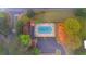 Aerial view showcasing the neighborhood pool with pool house, playground and parking at 3951 Lorien Nw Way, Kennesaw, GA 30152