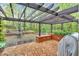 Back patio featuring a stone paver extension, with an outdoor dining area and wood pergola at 3951 Lorien Nw Way, Kennesaw, GA 30152