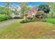 Beautiful red brick home with manicured lawn and mature trees in a desirable neighborhood at 3951 Lorien Nw Way, Kennesaw, GA 30152
