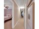 Hallway leading to bedrooms with carpet and neutral paint at 3951 Lorien Nw Way, Kennesaw, GA 30152