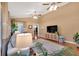 Open-concept living room showcasing hardwood floors, a decorative rug and a modern television console at 3951 Lorien Nw Way, Kennesaw, GA 30152