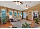 Bright living room featuring hardwood floors, ample windows and natural light and a neutral color palette at 3951 Lorien Nw Way, Kennesaw, GA 30152