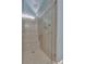 Modern shower with glass door, shower head, and tile surround at 3951 Lorien Nw Way, Kennesaw, GA 30152