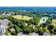 Expansive aerial view of a lush, green city park with baseball fields and surrounding neighborhood at 145 15Th Ne St # 204, Atlanta, GA 30309