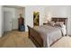 Bedroom with neutral carpet and a walk in closet with an organized shelving system at 145 15Th Ne St # 204, Atlanta, GA 30309
