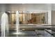 Modern building entrance with water fountain and artwork, creating an inviting and sophisticated arrival experience at 145 15Th Ne St # 204, Atlanta, GA 30309