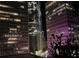 Cityscape view from the building showcasing surrounding office towers at night at 145 15Th Ne St # 204, Atlanta, GA 30309