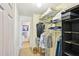 Organized walk-in closet with shelving and hanging racks, providing ample storage at 145 15Th Ne St # 204, Atlanta, GA 30309