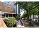Inviting outdoor seating area with lush greenery, perfect for dining and relaxation at 145 15Th Ne St # 204, Atlanta, GA 30309