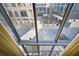 Urban vista from a window reveals a vibrant cityscape with an outdoor patio at 145 15Th Ne St # 204, Atlanta, GA 30309