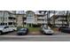 Apartment building with beige siding and a parking area at 1701 Augusta Se Dr # 1701, Marietta, GA 30067