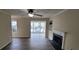 Spacious living room featuring a cozy fireplace and an abundance of natural light at 1701 Augusta Se Dr # 1701, Marietta, GA 30067