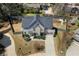 Overhead shot of a home with a well-maintained lawn, long driveway, and fenced-in backyard at 1732 Red Maple Rdg, Atlanta, GA 30316