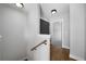 Upstairs hallway with hardwood floors and a view into the adjacent room at 1732 Red Maple Rdg, Atlanta, GA 30316