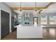 Modern kitchen with a large center island, stainless steel appliances, and stylish pendant lighting at 1732 Red Maple Rdg, Atlanta, GA 30316