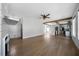 Spacious living room with a fireplace, hardwood floors, and an open layout to the kitchen at 1732 Red Maple Rdg, Atlanta, GA 30316