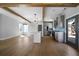 Spacious open-concept living area with a modern kitchen, hardwood floors, and plenty of natural light at 1732 Red Maple Rdg, Atlanta, GA 30316