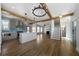 Spacious open floorplan featuring a modern kitchen, living area, and staircase, perfect for entertaining at 1732 Red Maple Rdg, Atlanta, GA 30316